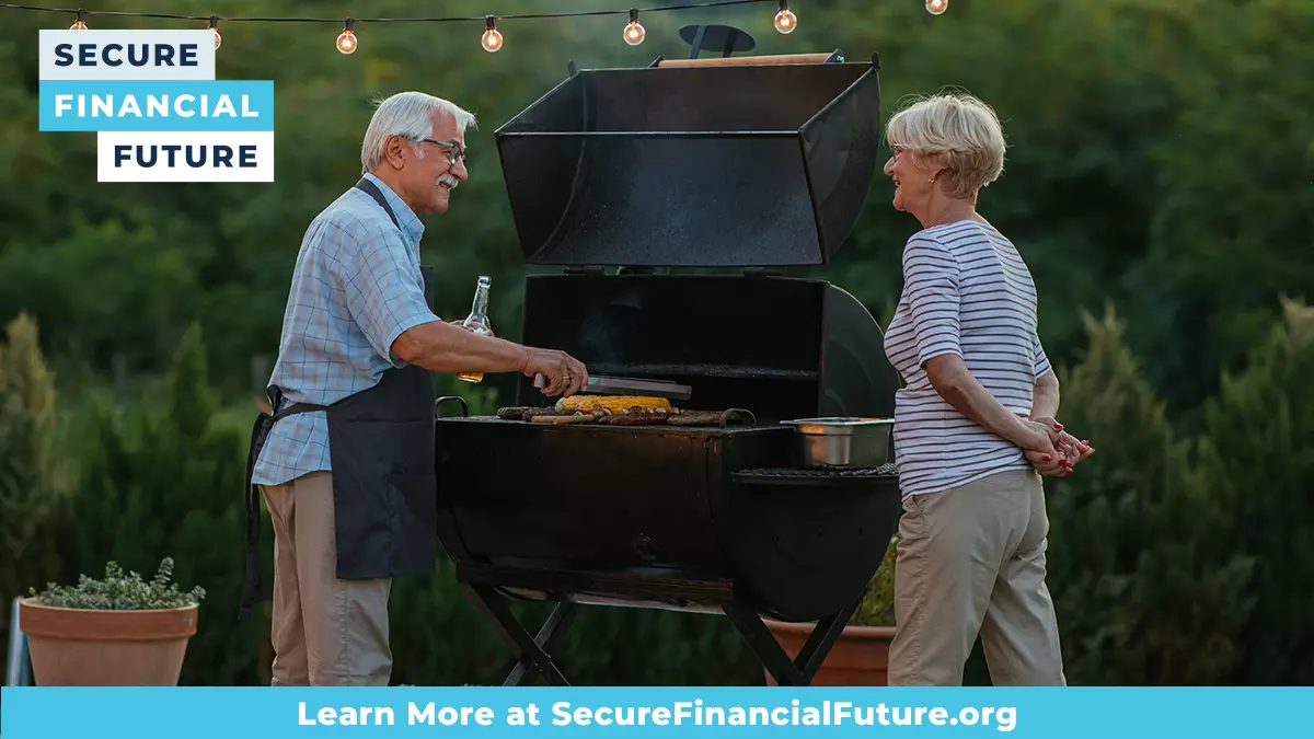 Retired couple grilling - social sized image